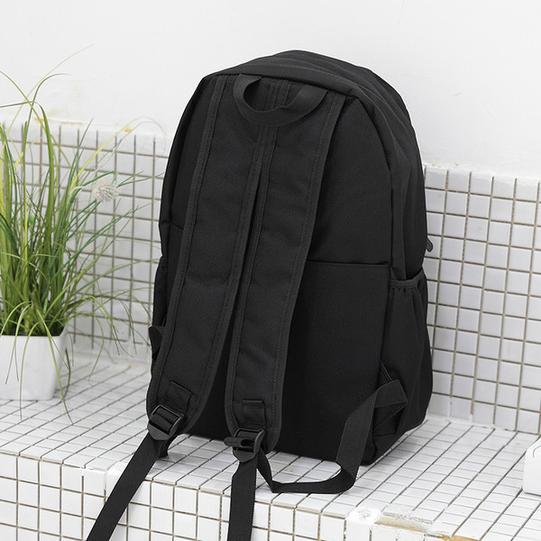 Ανδρικό σακίδιο σε μαύρο χρώμα με επιγραφή