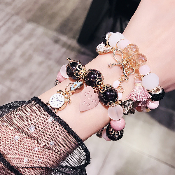 Γυναικείο βραχιόλι με μενταγιόν και χάντρες σε δύο χρώματα