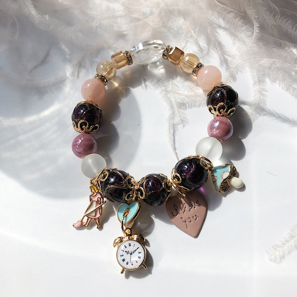 Γυναικείο βραχιόλι με μενταγιόν και χάντρες σε δύο χρώματα