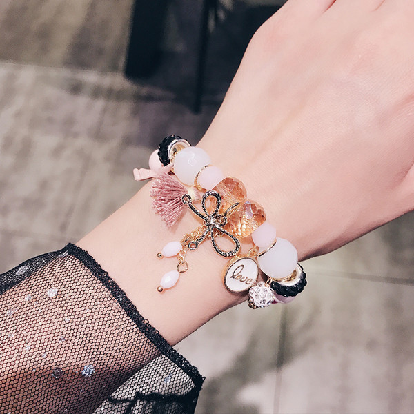 Γυναικείο βραχιόλι με μενταγιόν και χάντρες σε δύο χρώματα