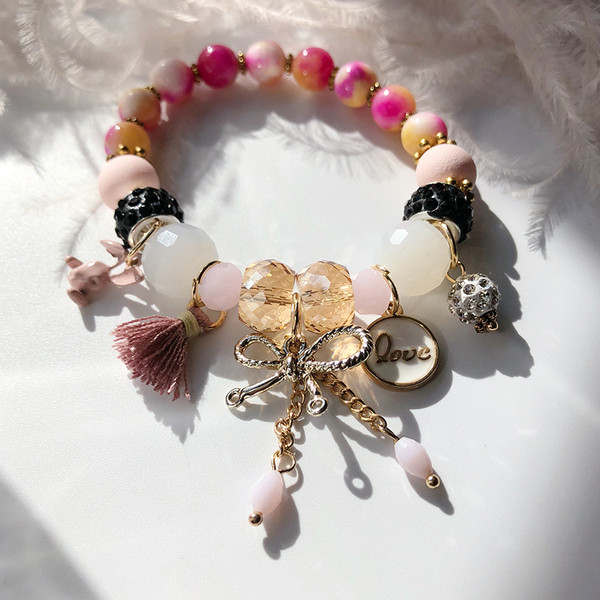 Γυναικείο βραχιόλι με μενταγιόν και χάντρες σε δύο χρώματα