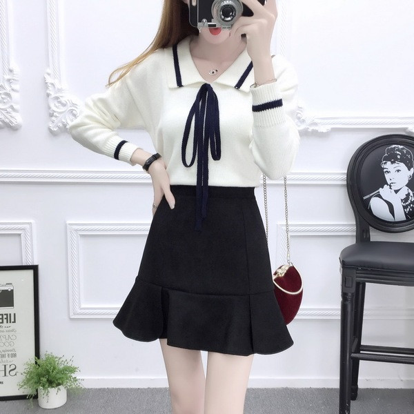 Κομψή κυρία που αποτελείται από δύο μέρη πουλόβερ + φούστα - δύο χρώματα