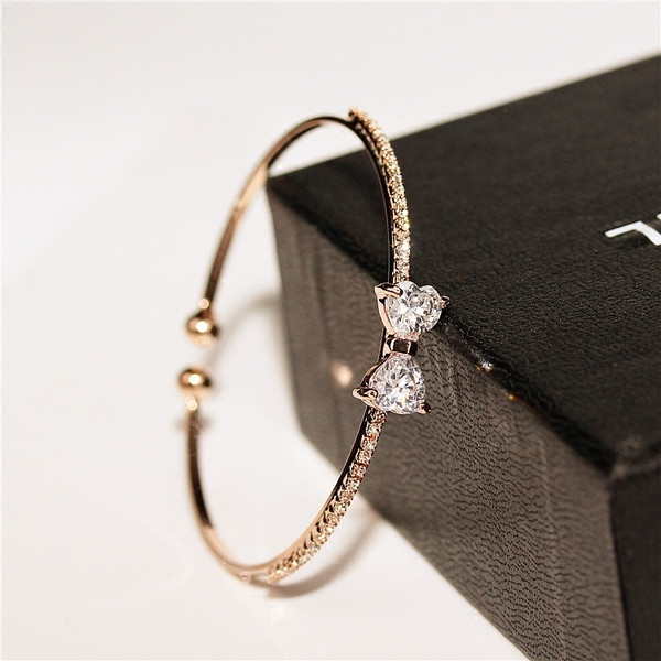 Bratara de dama moderna cu pietre decorative in doua culori