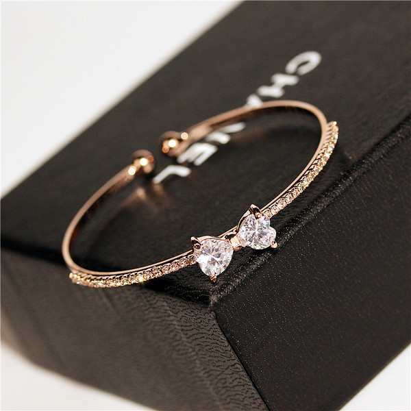 Bratara de dama moderna cu pietre decorative in doua culori