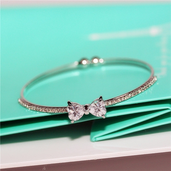 Bratara de dama moderna cu pietre decorative in doua culori