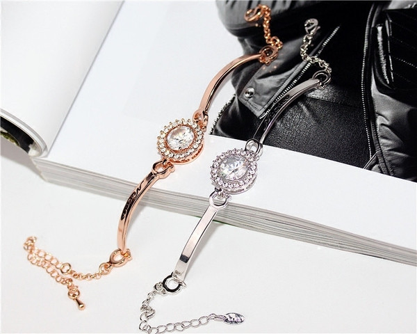 Brățară elegantă de damă cu pietre de culoare argintie și aurie