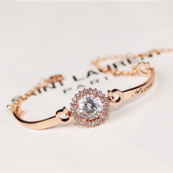 Brățară elegantă de damă cu pietre de culoare argintie și aurie