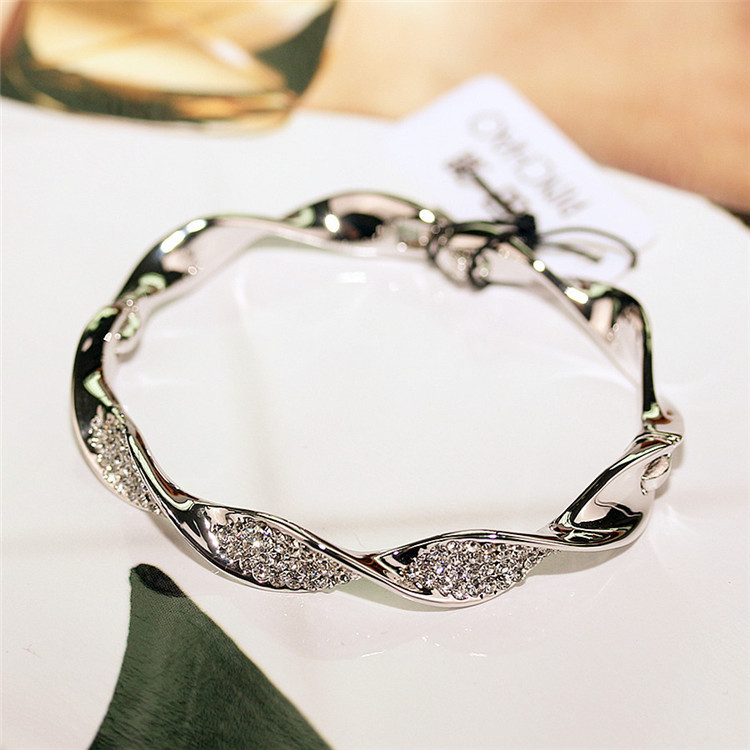 Γυναικείο βραχιόλι με διακοσμητικές πέτρες σε δύο χρώματα