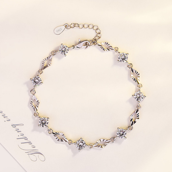 Bratara eleganta de dama cu pietre de culoare argintie