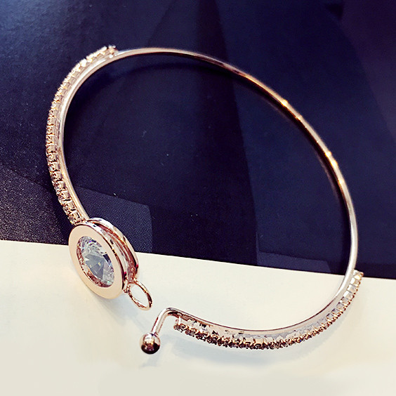 Brățară elegantă de damă cu pietre în două culori