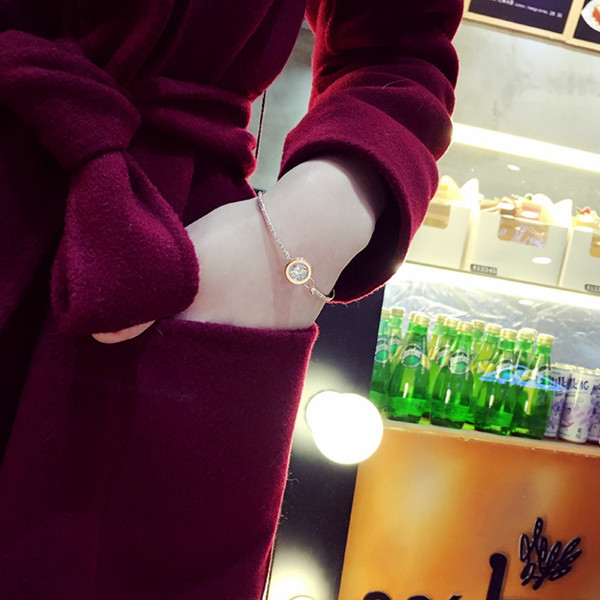 Brățară elegantă de damă cu pietre în două culori