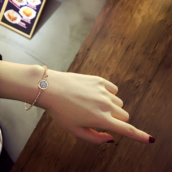 Brățară elegantă de damă cu pietre în două culori