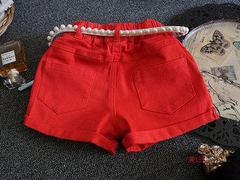 Актуални детски къси панталони за момичета  в червен цвят с колан 