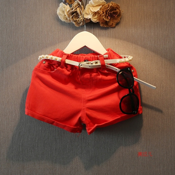 Aktuális gyerek rövidnadrág lányoknak piros színben, övvel