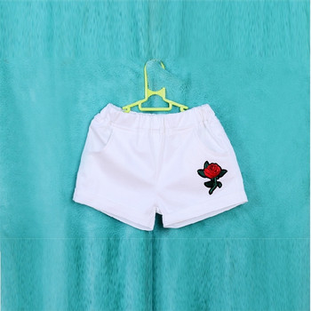 Модерни детски панталони за момичета с цветна бродерия в бял цвят 
