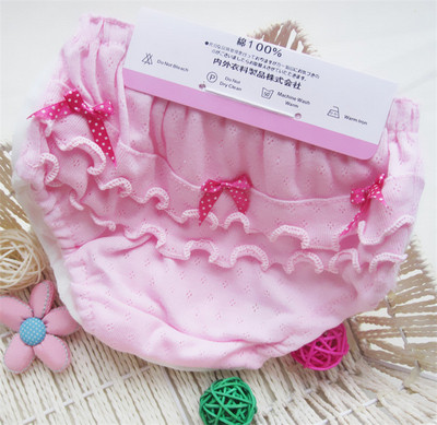 Gyermek fehérnemű lányoknak fehér és rózsaszín szalagokkal - négy darabból álló készlet