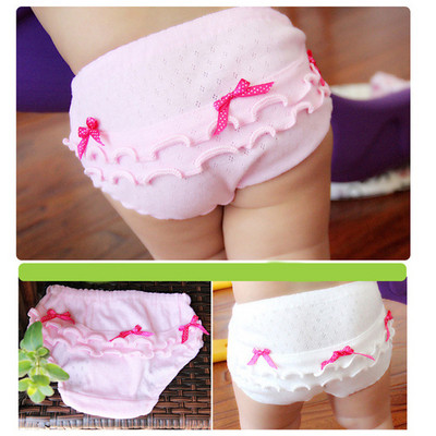 Children`s underwear for girls with ribbons in white and pink - a set of four pieces