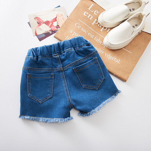 Modern, rövid gyerekfarmer lányoknak színes hímzéssel