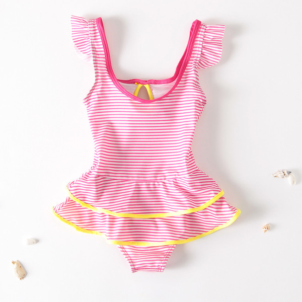 Modern gyerek fürdőruha virágdíszítéssel két színben