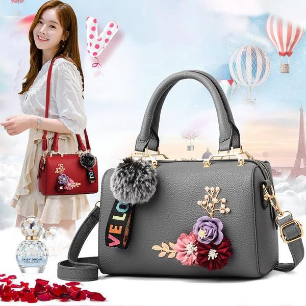 Geanta de dama eleganta din piele ecologica cu elemente florale