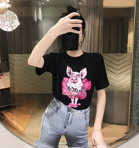 Γυναικεία καθημερινή μπλούζα σε λευκό και μαύρο με εφαρμογή