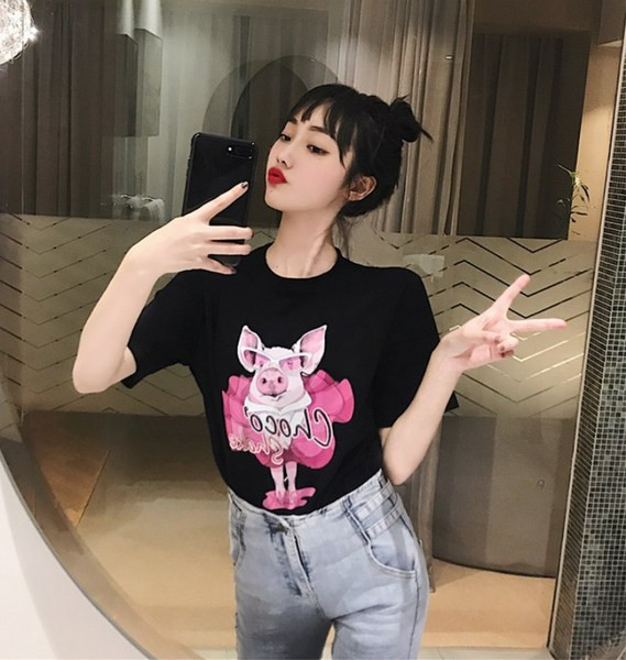 Γυναικεία καθημερινή μπλούζα σε λευκό και μαύρο με εφαρμογή