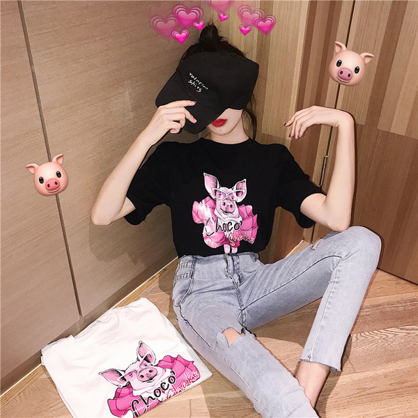 Γυναικεία καθημερινή μπλούζα σε λευκό και μαύρο με εφαρμογή