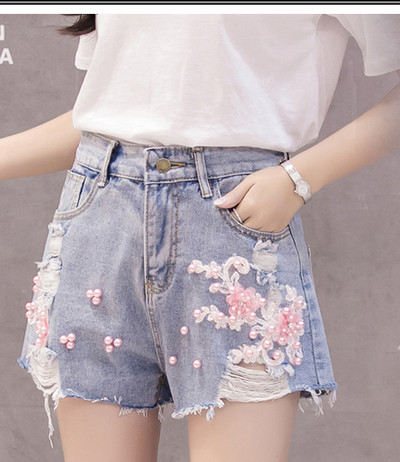 Női topikus nadrág magas derékkal és gyöngyökkel