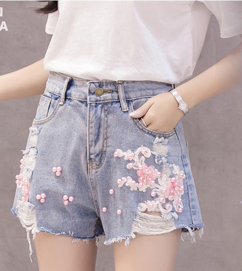 Női topikus nadrág magas derékkal és gyöngyökkel