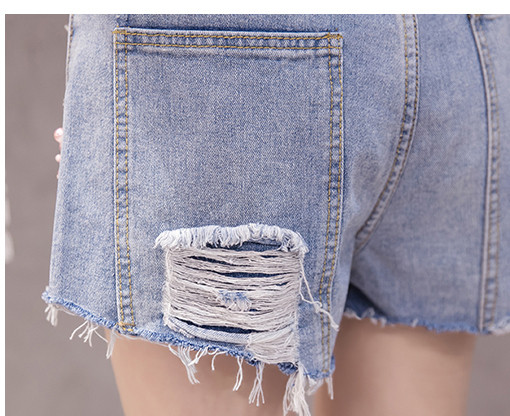 Női topikus nadrág magas derékkal és gyöngyökkel