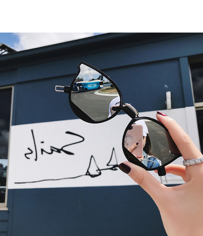 Τρέχοντα γυαλιά ηλίου κυρίες με καθρέφτες σε μαύρο χρώμα