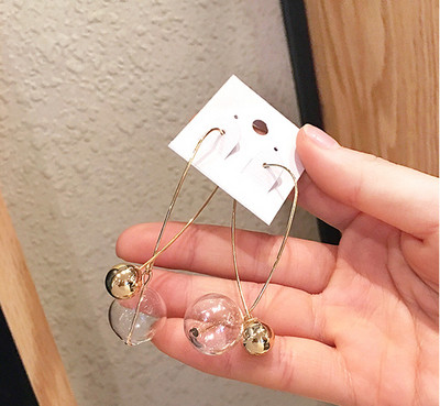 Cercei lungi de dama cu pandantive de culoare aurie