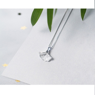 Napi női nyaklánc ezüst színben medállal