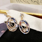 Cercei lungi de dama cu pietre decorative