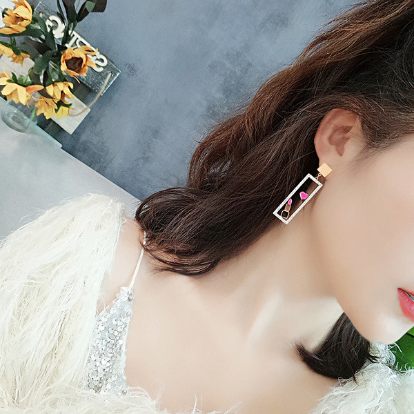 Női felső fülbevaló díszítő kövekkel