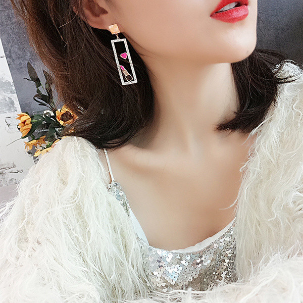 Női felső fülbevaló díszítő kövekkel