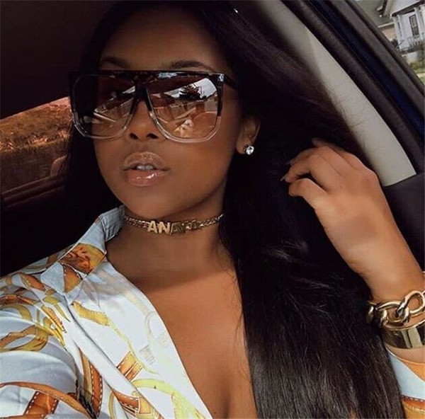 Aktuális női napszemüveg széles kerettel több színben