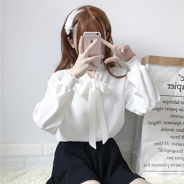 Κομψή γυναικεία πουκάμισο με κορδέλα σε λευκό και ροζ χρώμα