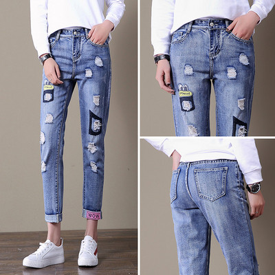 Blugi de dama moderni cu talie inalta si motive rupte