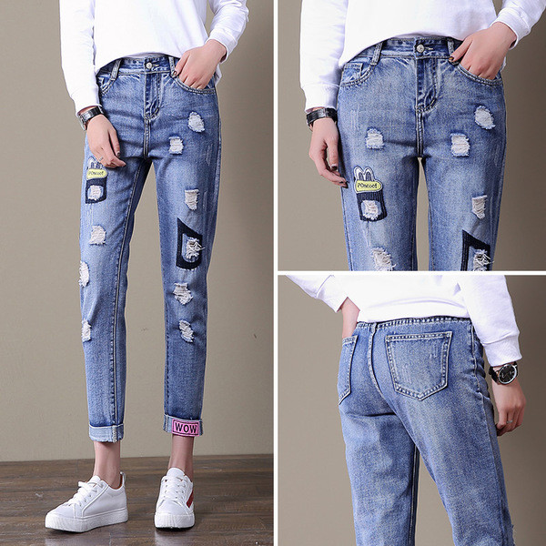 Blugi de dama moderni cu talie inalta si motive rupte