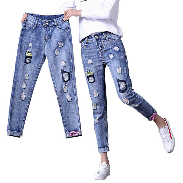 Blugi de dama moderni cu talie inalta si motive rupte