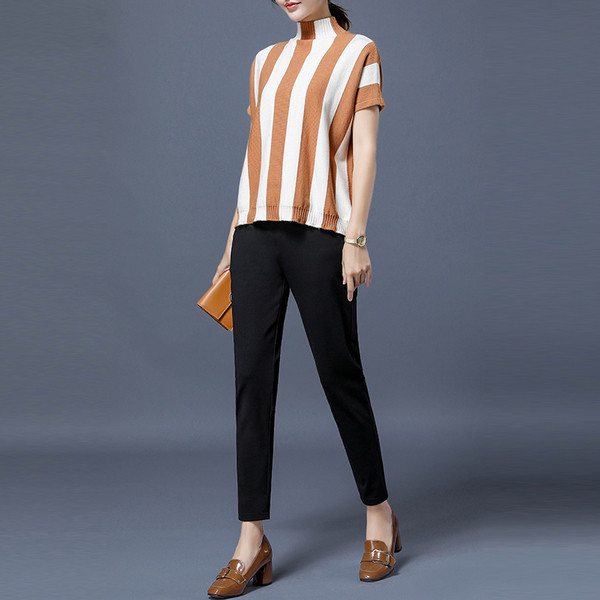 Modern női nadrág fém elemmel, két színben