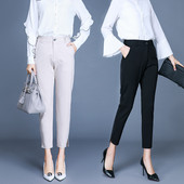 Modern női nadrág két színben, oldalán hasítékkal