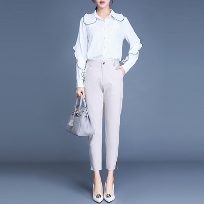 Modern női nadrág két színben, oldalán hasítékkal