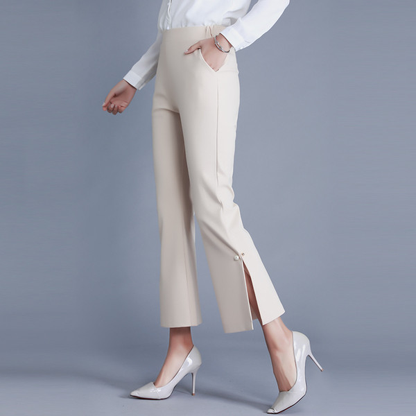 Stílusos női nadrág magas derékkal, oldalt hasítékkal