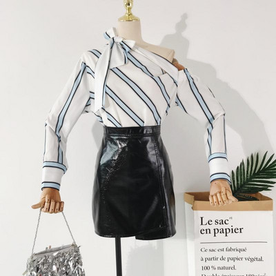 Stílusos női ing ejtett ujjakkal és szalaggal, két színben