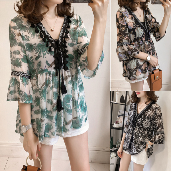 Κομψή γυναικεία μπλούζα με μανίκια 3/4 και φυτικά μοτίβα σε διάφορα χρώματα