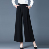 Modern női magas derekú nadrág fekete-fehér színben