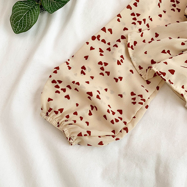 Cămașă modernă de damă cu șireturi și model în două culori