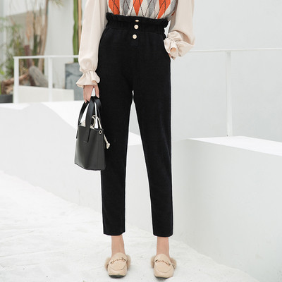 Μοντέρνα γυναικεία παντελόνια σε δύο ψηλά χρώματα μέσης και κουμπιά